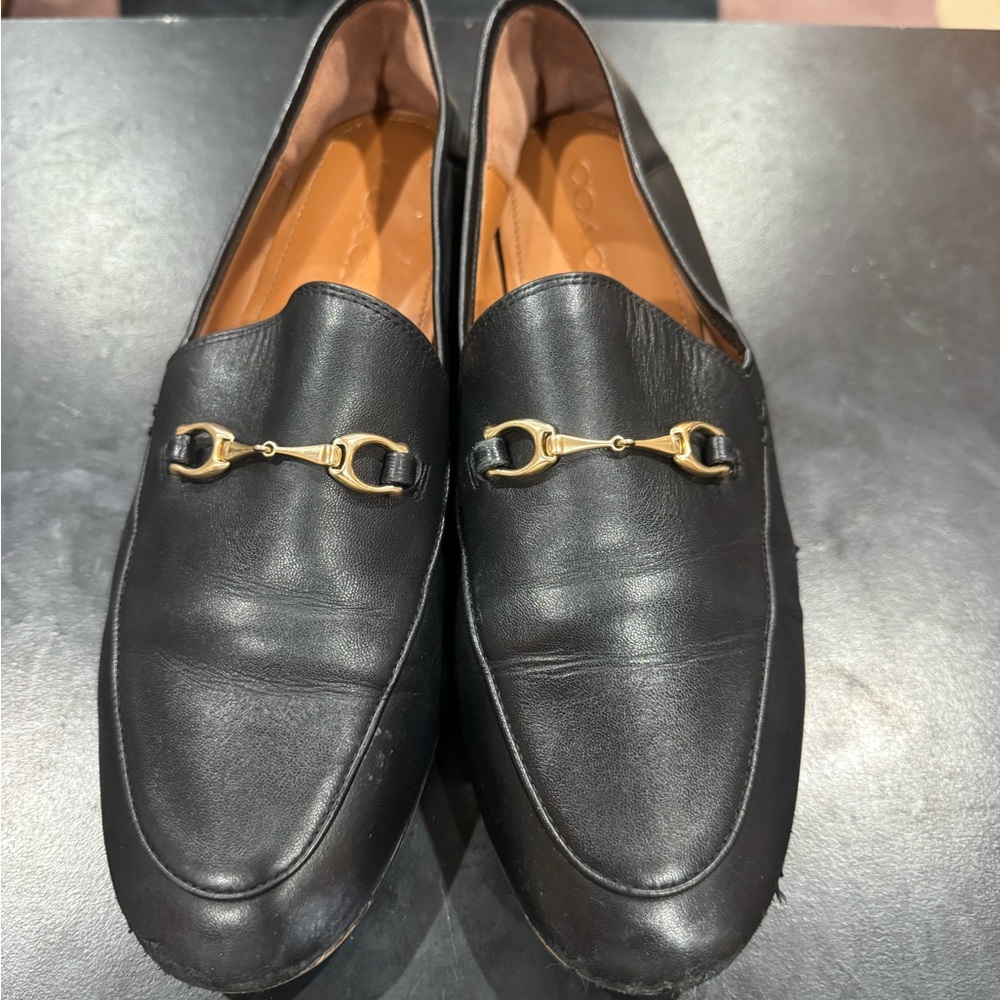 Coach Black Leather Slip-Ons with Gold Buckles